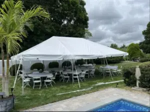 tent, chair and table in outside set-up in pool